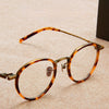 Henk Titanium Vintage Oval Eyeglasses Frame